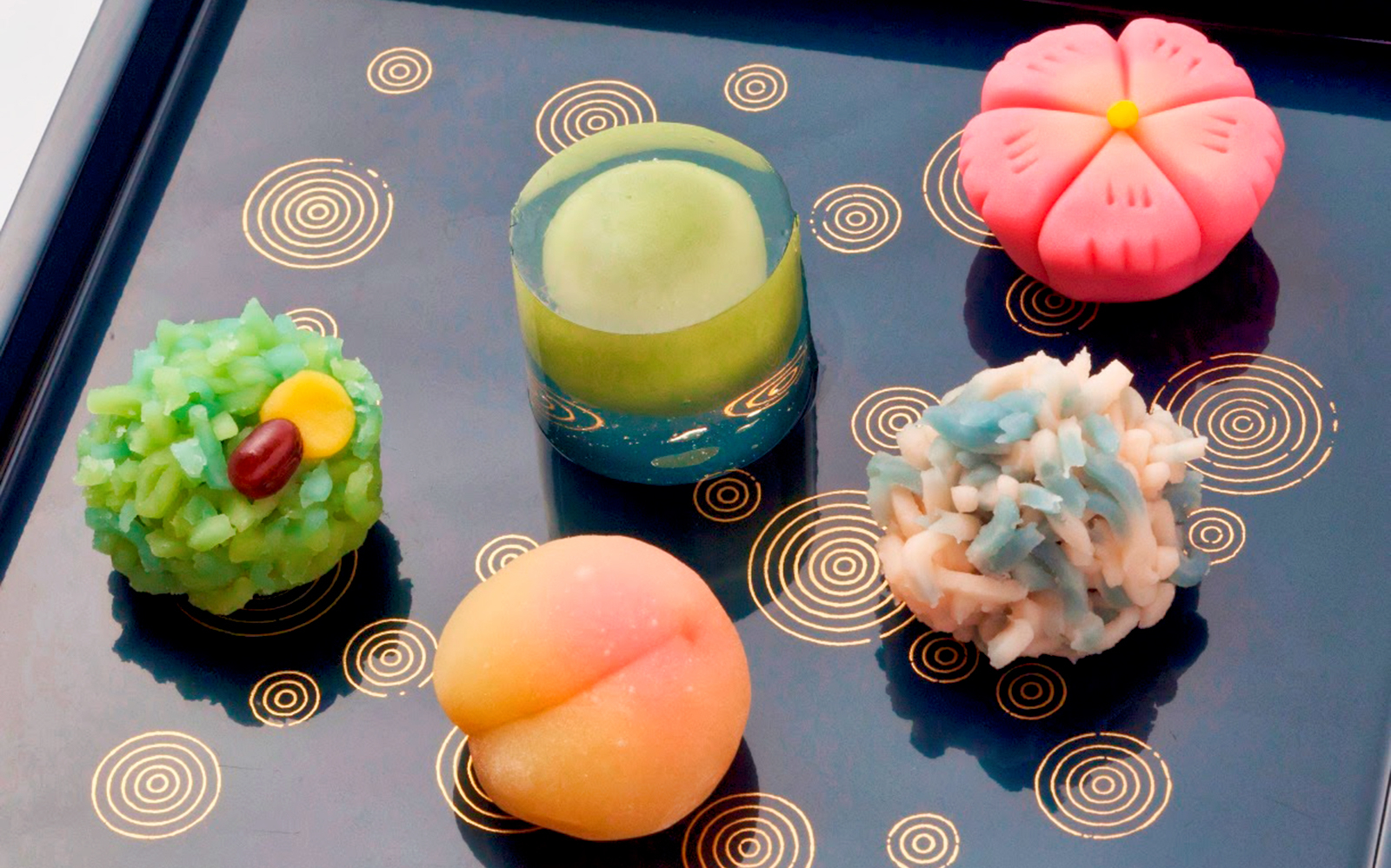 Wagashi sweets assortment on decorative tray, part of Flavors of Japan Tour.