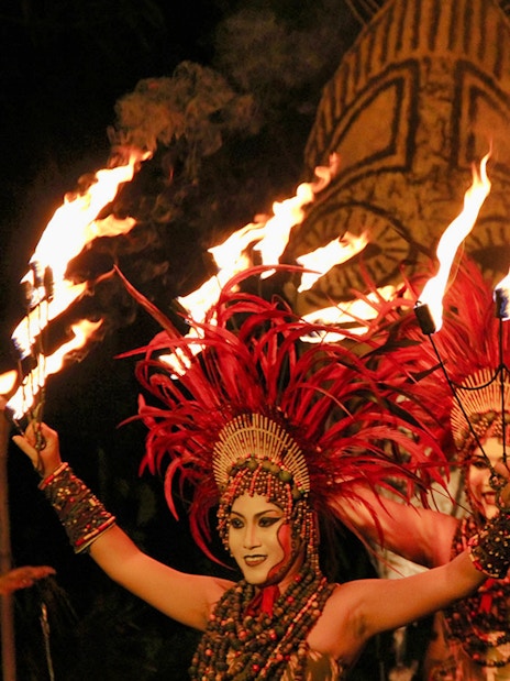 Fire dancers performing at Bali Safari and Marine Park night safari.
