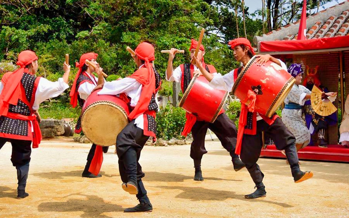 Traditional drum performance at Okinawa Ryukyu Mura Village.