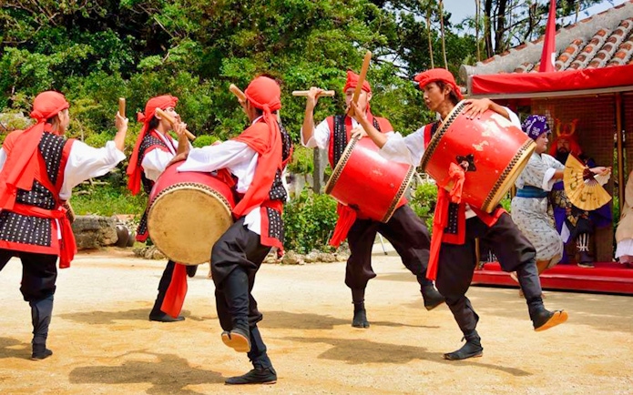 Traditional drum performance at Okinawa Ryukyu Mura Village.