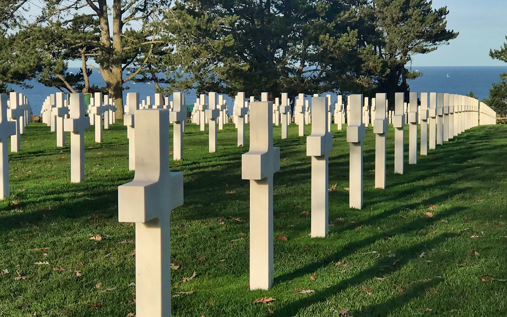 Normandy American Cemetery crosses overlooking the sea on a D-Day tour from Paris.