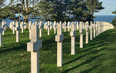 Normandy American Cemetery crosses overlooking the sea on a D-Day tour from Paris.