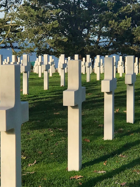 Normandy American Cemetery crosses overlooking the sea on a D-Day tour from Paris.