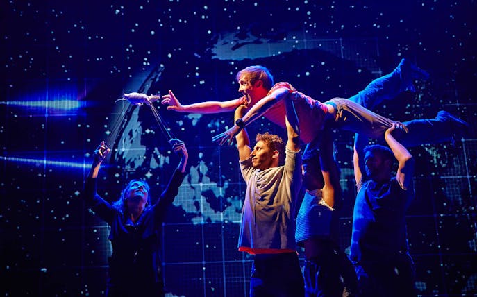 Actors performing a scene from "The Curious Incident of the Dog in the Night-Time" in Manchester.