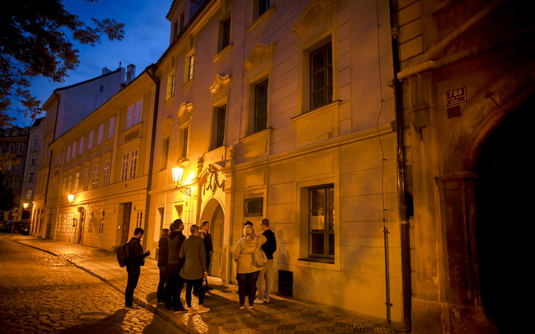 Group on Prague evening tour exploring Old Town legends.