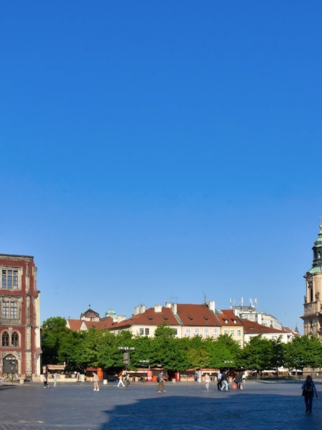 Astronomical Clock tower and surrounding buildings in Prague's Old Town Square.
