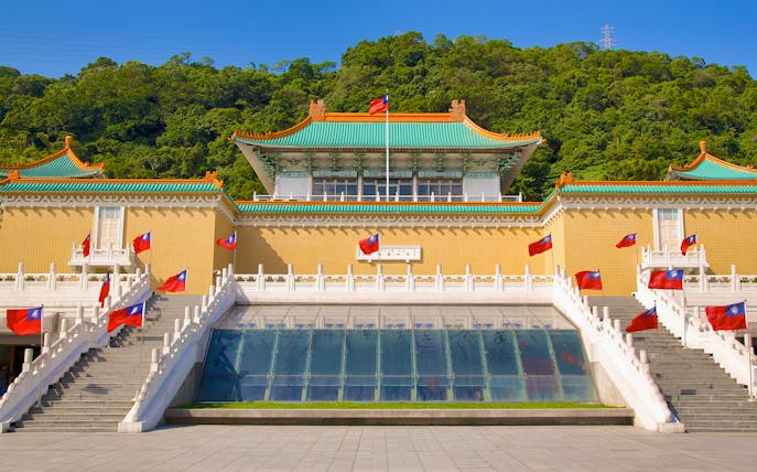 National Palace Museum entrance with flags, Taipei.