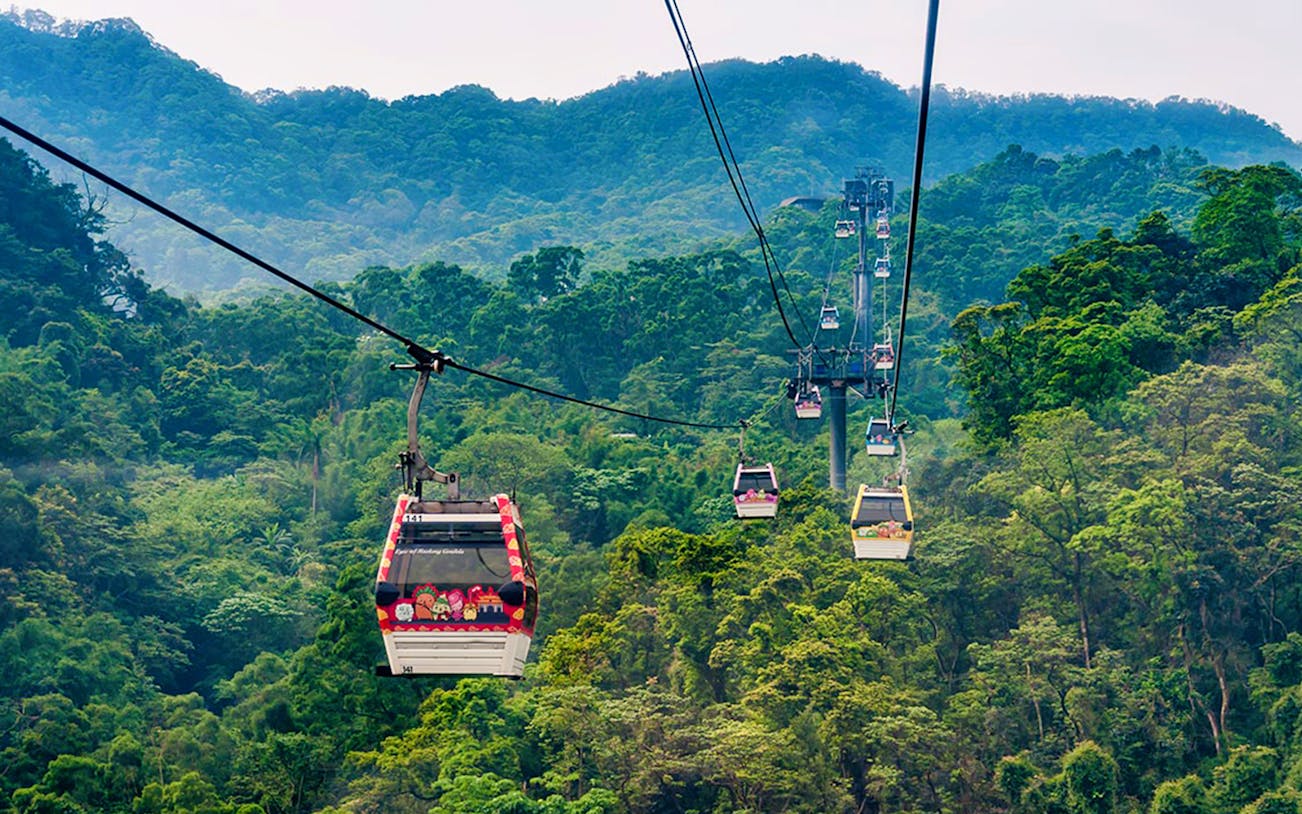 Maokong Gondola over lush green hills in Taipei, Taiwan.