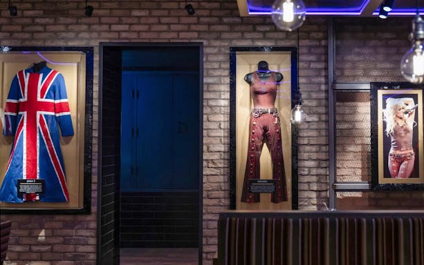 Union Jack coat and stage outfits displayed at Hard Rock Cafe London.