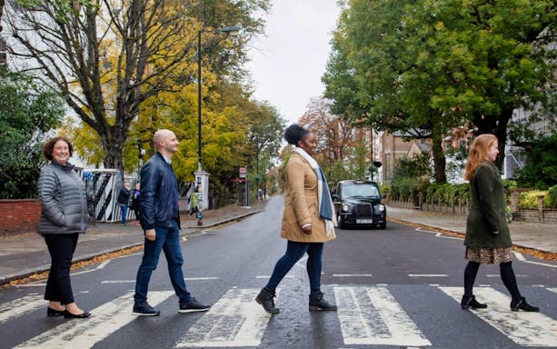 People crossing Abbey Road in London on the Hard Rock Tour.