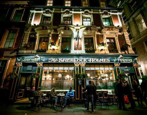 Sherlock Holmes pub exterior at night, part of Jack The Ripper & Haunted London Tour.