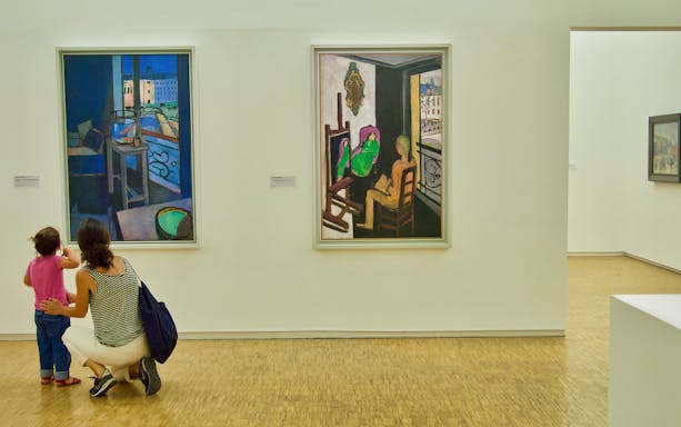 Visitors viewing paintings at Centre Pompidou, Paris.