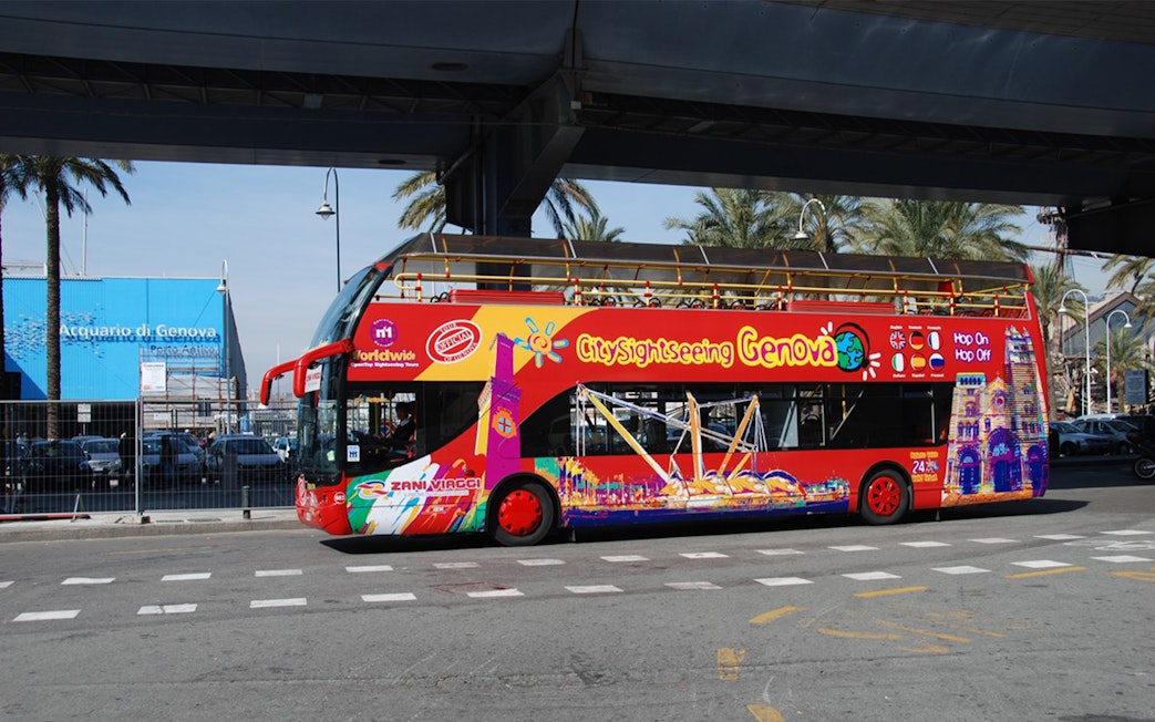 Hop-on-hop-off sightseeing bus in Genoa near Acquario di Genova.