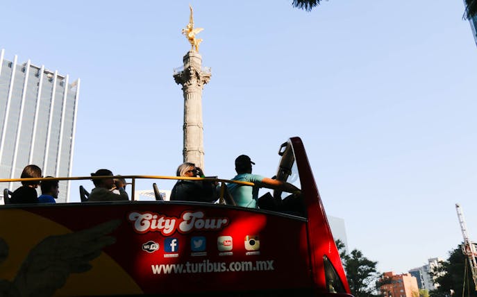 Open-top bus near Angel of Independence, Mexico City, on Turibus tour.
