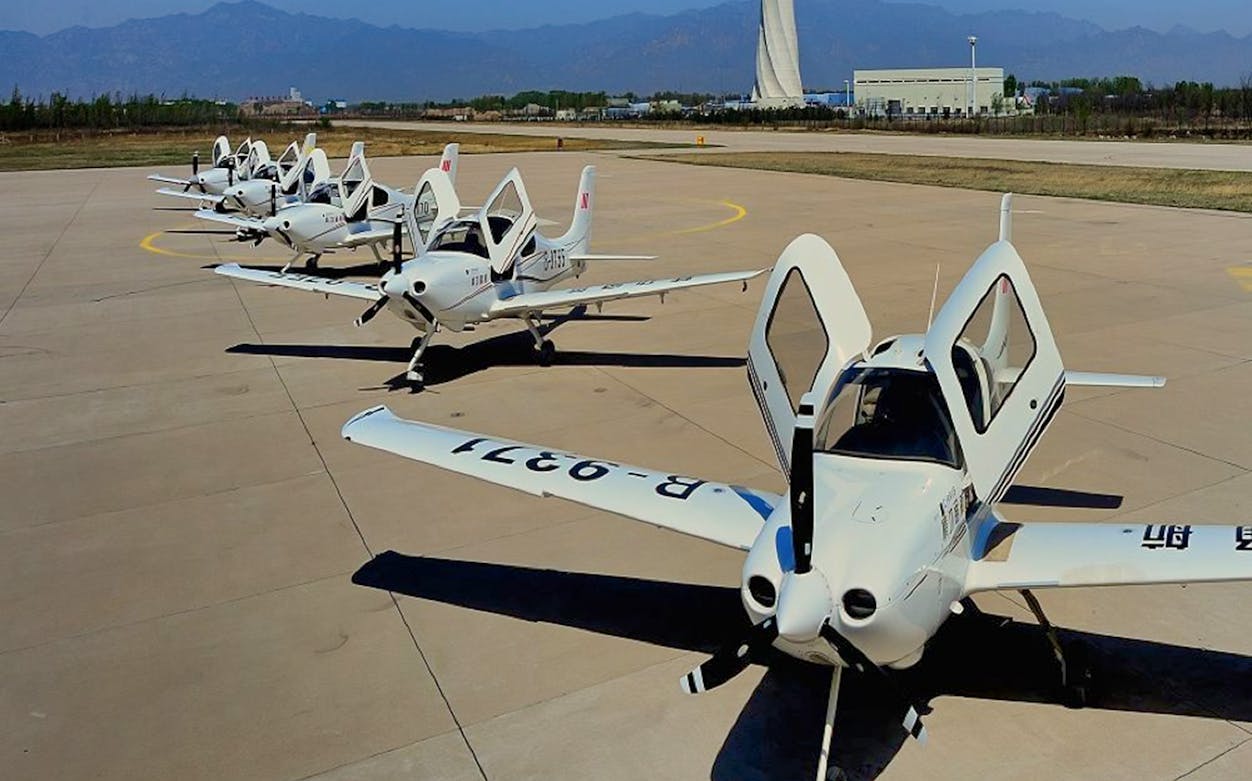 Helicopters lined up for Badaling Great Wall tour, Beijing airport.