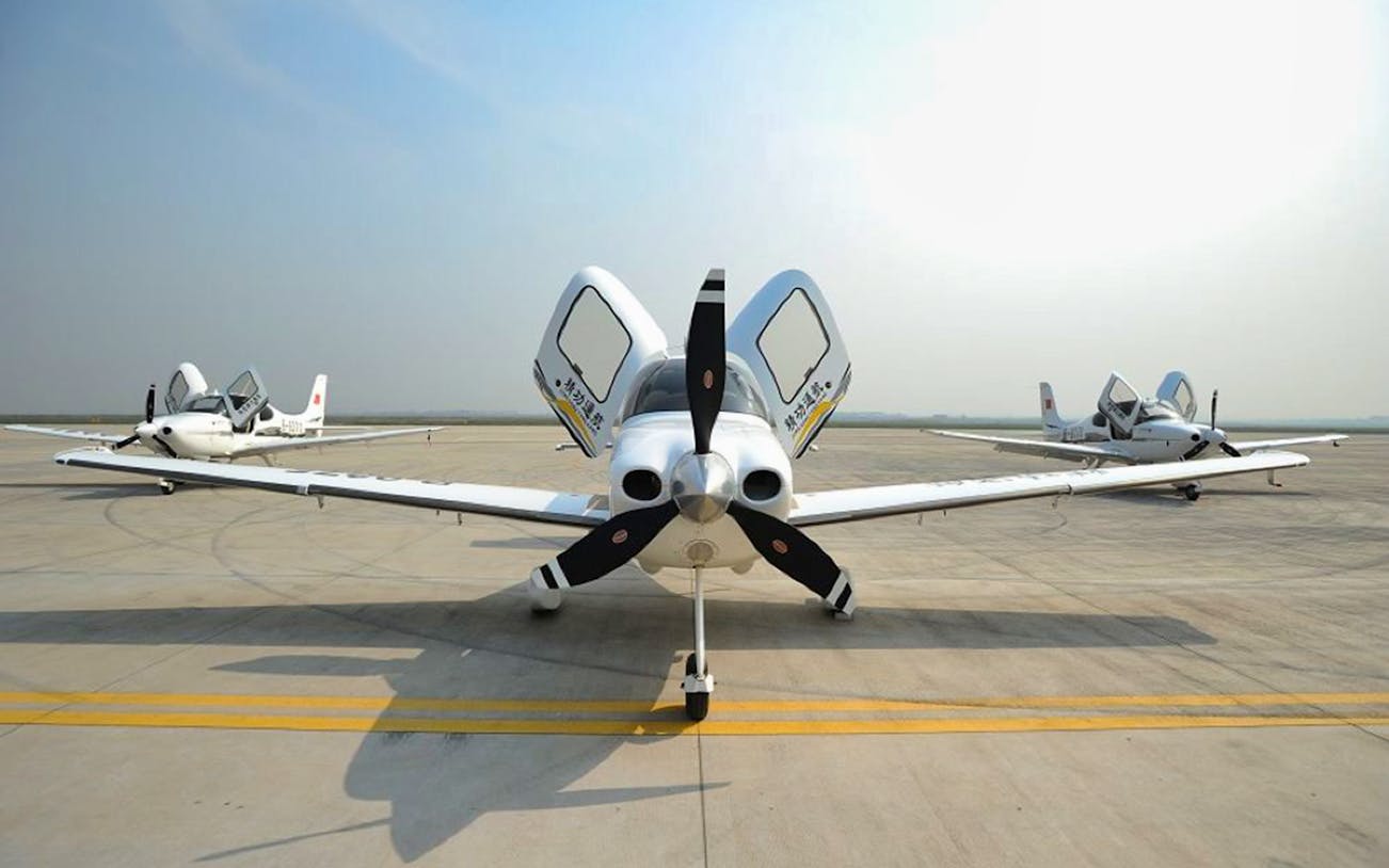Helicopters on tarmac for Badaling Great Wall aerial tour in Beijing, China.