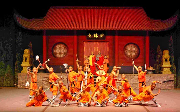 Shaolin monks performing martial arts at Beijing Red Theatre.