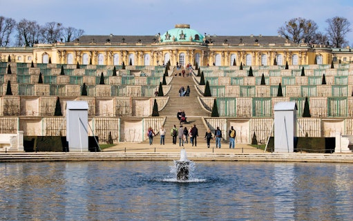 Sanssouci Palace terraced gardens with visitors, Berlin.