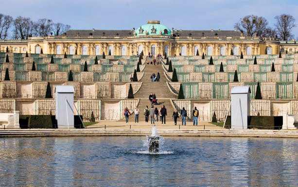 Sanssouci Palace terraced gardens with visitors, Berlin.