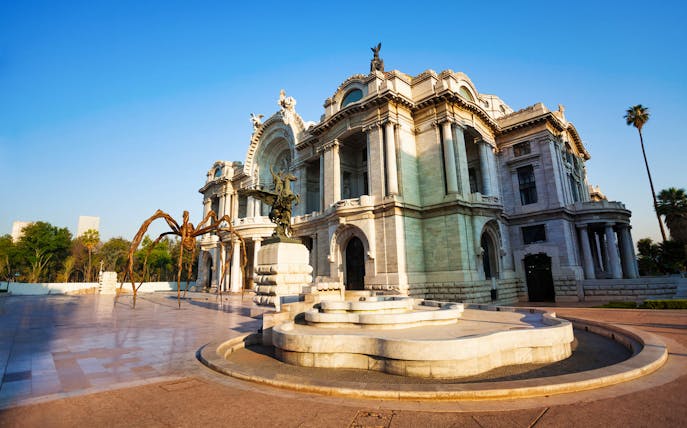 Bellas Artes Palace in Mexico City with outdoor sculpture.