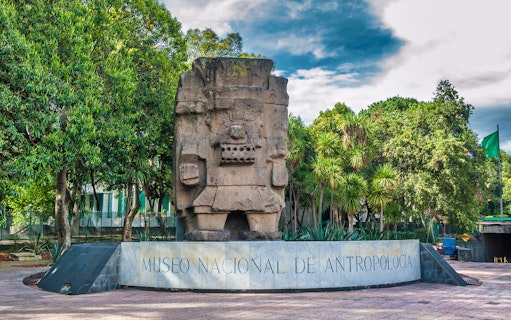Stone sculpture at the entrance of the National Museum of Anthropology, Mexico City.