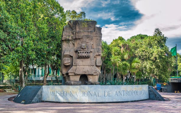 Stone sculpture at the entrance of the National Museum of Anthropology, Mexico City.