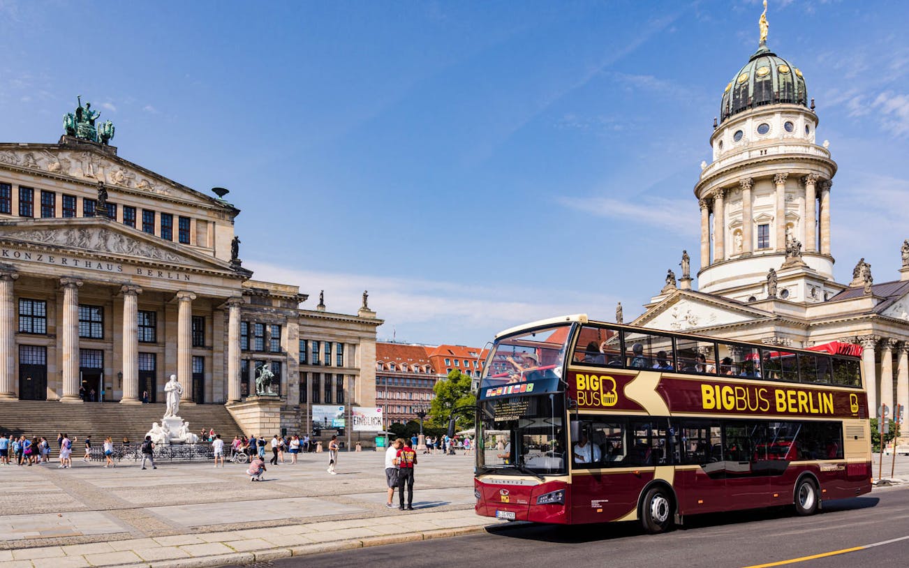 Big Bus Berlin in front of Konzerthaus and French Cathedral at Gendarmenmarkt.