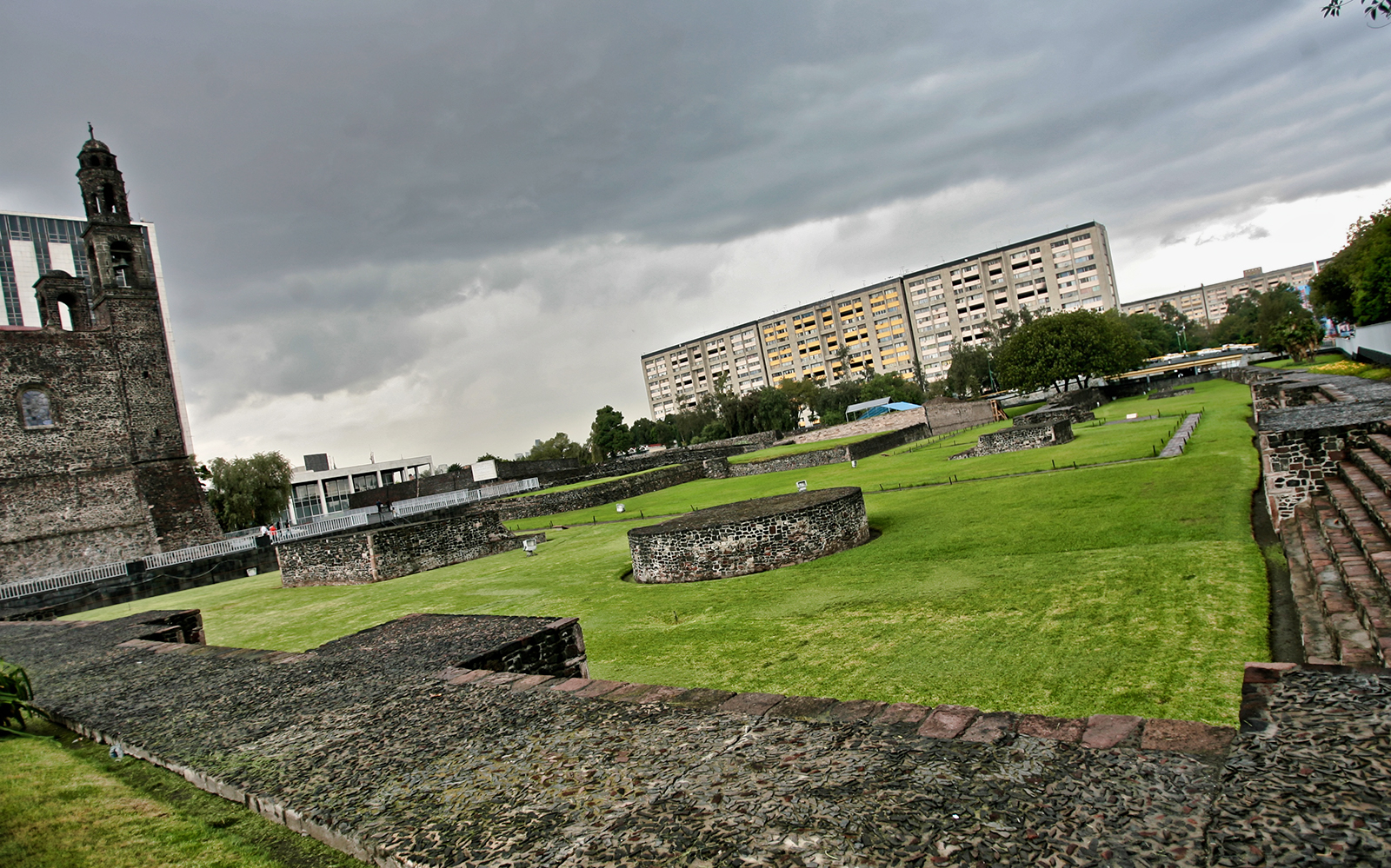 Three Cultures Square in Mexico City with ancient ruins and modern buildings.