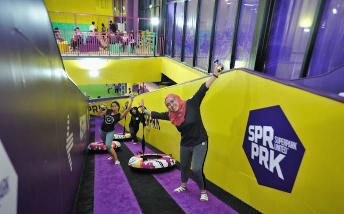 Visitors enjoying activities at SuperPark Kuala Lumpur indoor playground.