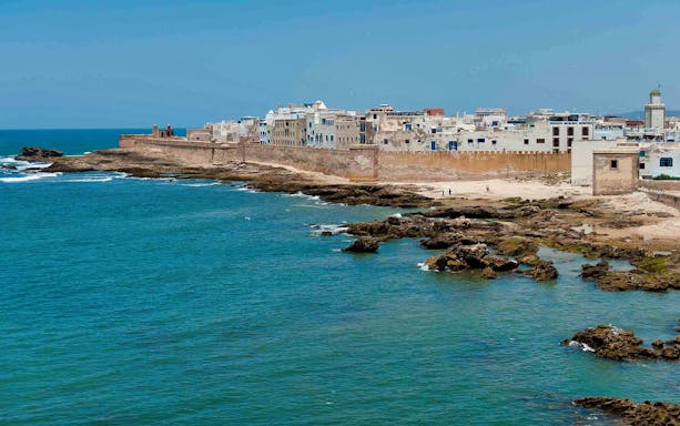 Essaouira coastal view with historic medina walls and ocean, Morocco.