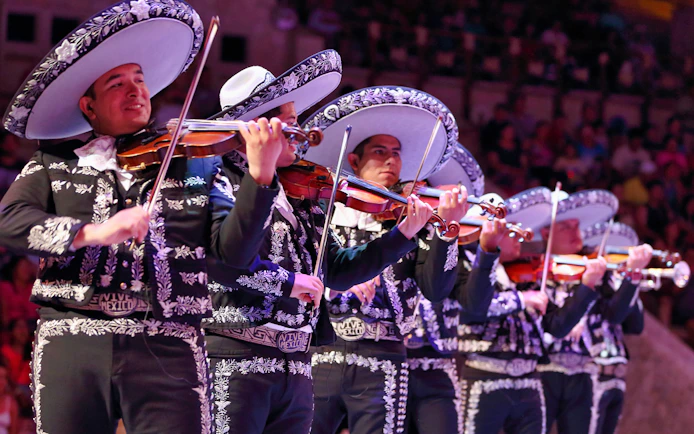 Mariachi band performing at Xcaret Park night show.