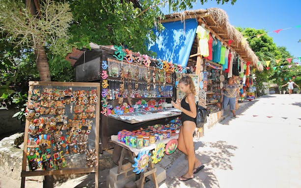 Colorful market stall with crafts and souvenirs on Isla Mujeres.