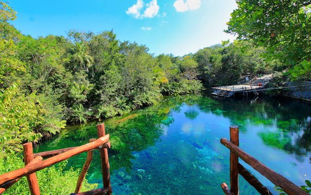 Cenote dive and zip line experience in Cancun's Mayan Adventure tour.