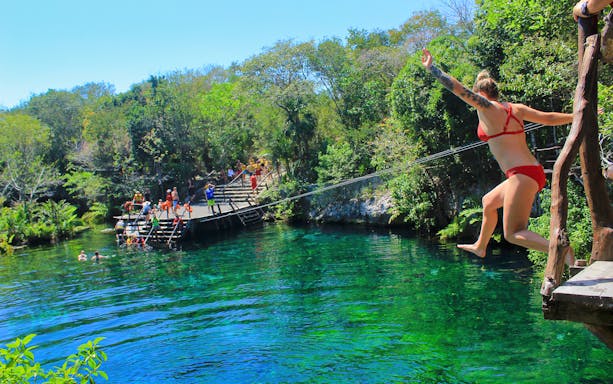 Cenote dive and zip line experience in Cancun's Mayan Adventure tour.