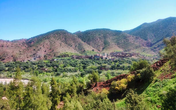Ourika Valley landscape with Atlas Mountains in the background, Morocco.