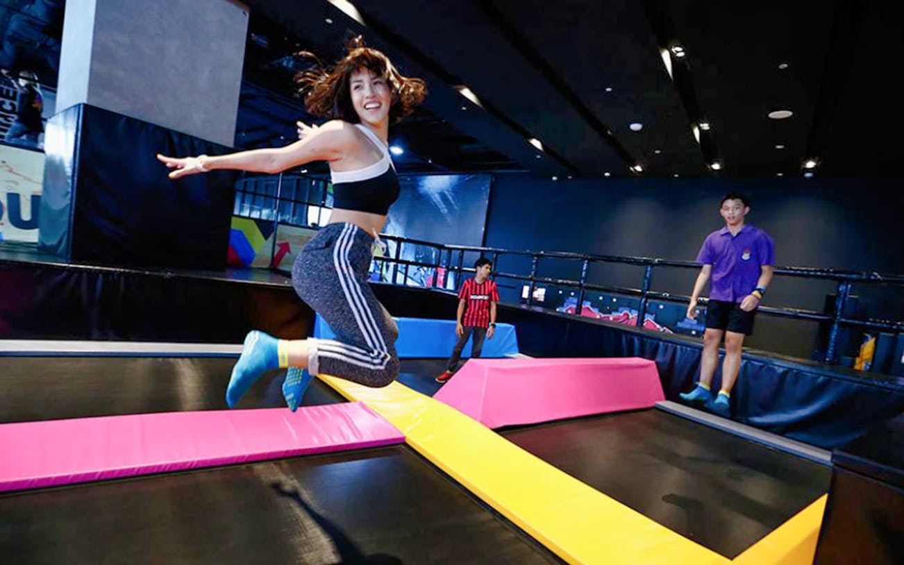 Person jumping on trampoline at BOUNCE Thailand, The EmQuartier.