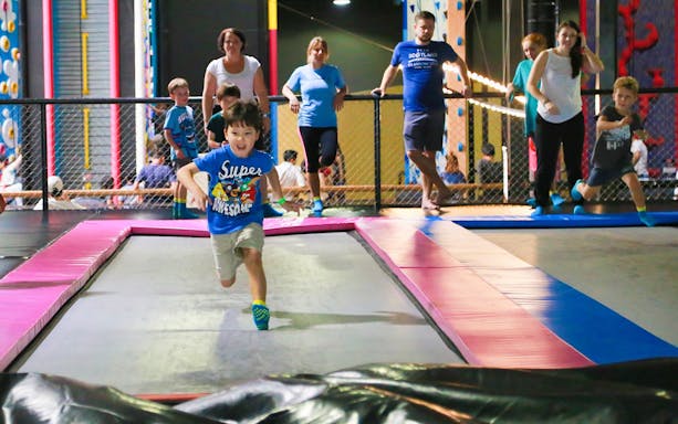 Children playing on trampolines at BOUNCE Thailand, The EmQuartier.