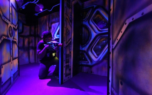 Participant playing laser tag at Playsquare Laser Tag, Central World.