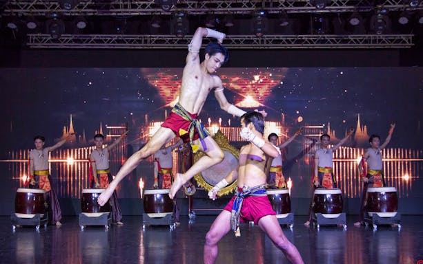 Performers in traditional attire during Mirinn Cabaret Show Bangkok.