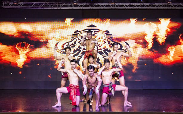 Performers in traditional attire at Mirinn Cabaret Show, Bangkok.