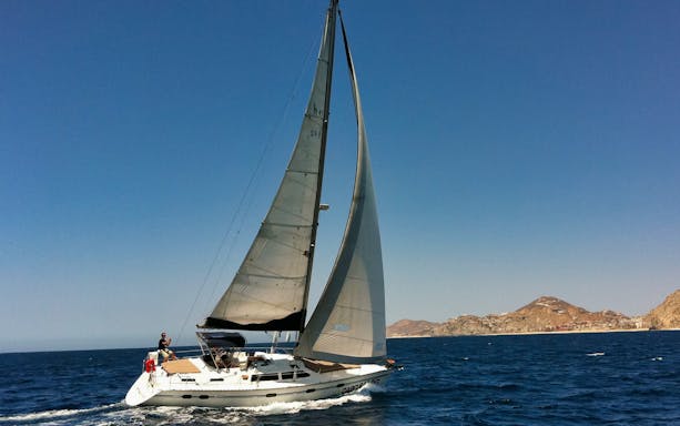 Sunset dinner cruise with tequila tasting on a boat in Cabo San Lucas, Mexico.