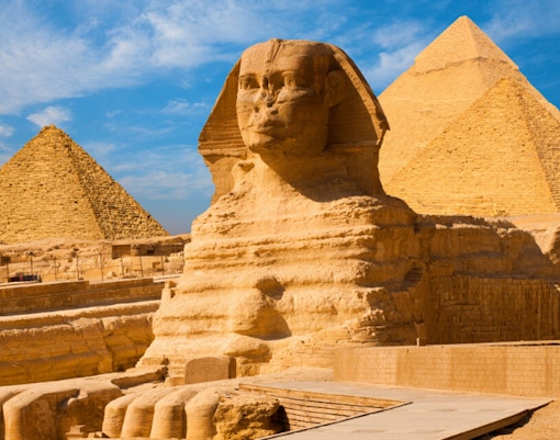 Sphinx and Pyramids of Giza under blue sky, Ancient Egypt Virtual Tour.