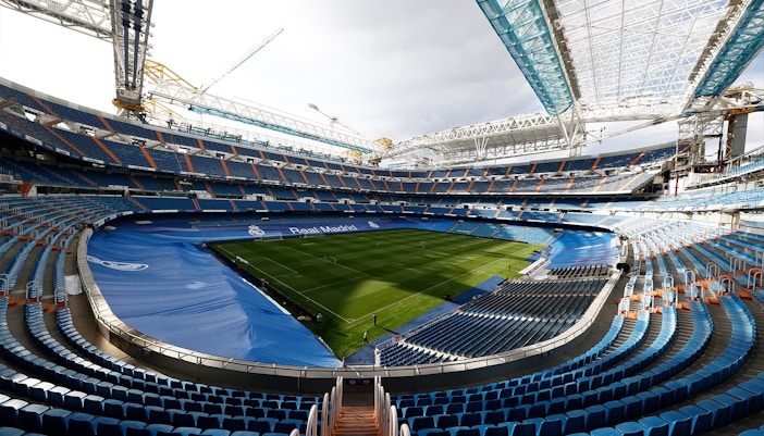 Santiago Bernabéu Stadium exterior with visitors entering for museum tour, Madrid, Spain.