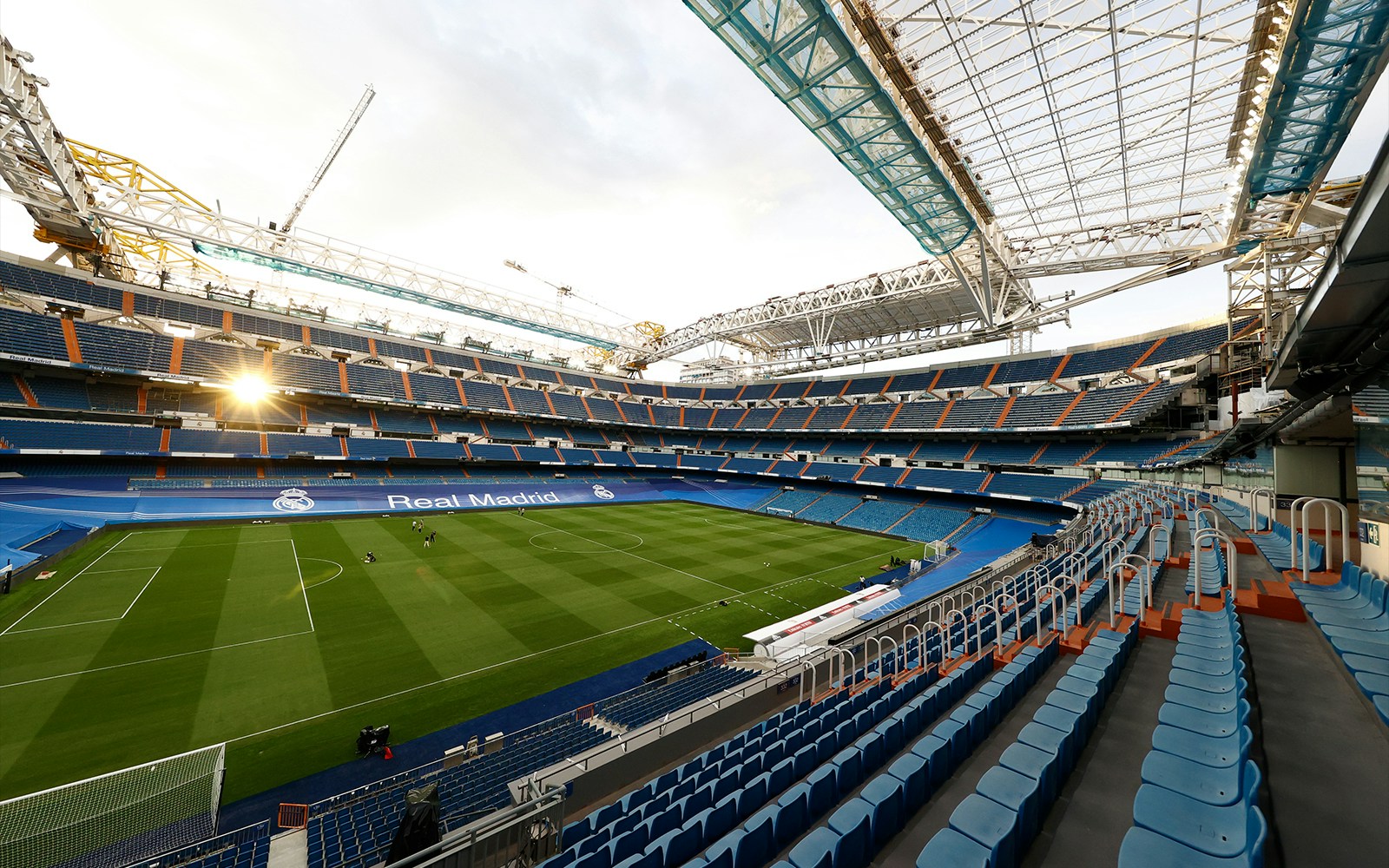 Santiago Bernabéu Stadium exterior with visitors entering for museum tour.