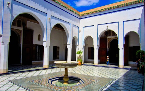 Courtyard of Bahia Palace in Marrakesh with central fountain.