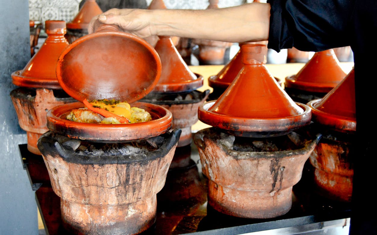 Marrakesh street market with traditional Moroccan spices and local vendors.