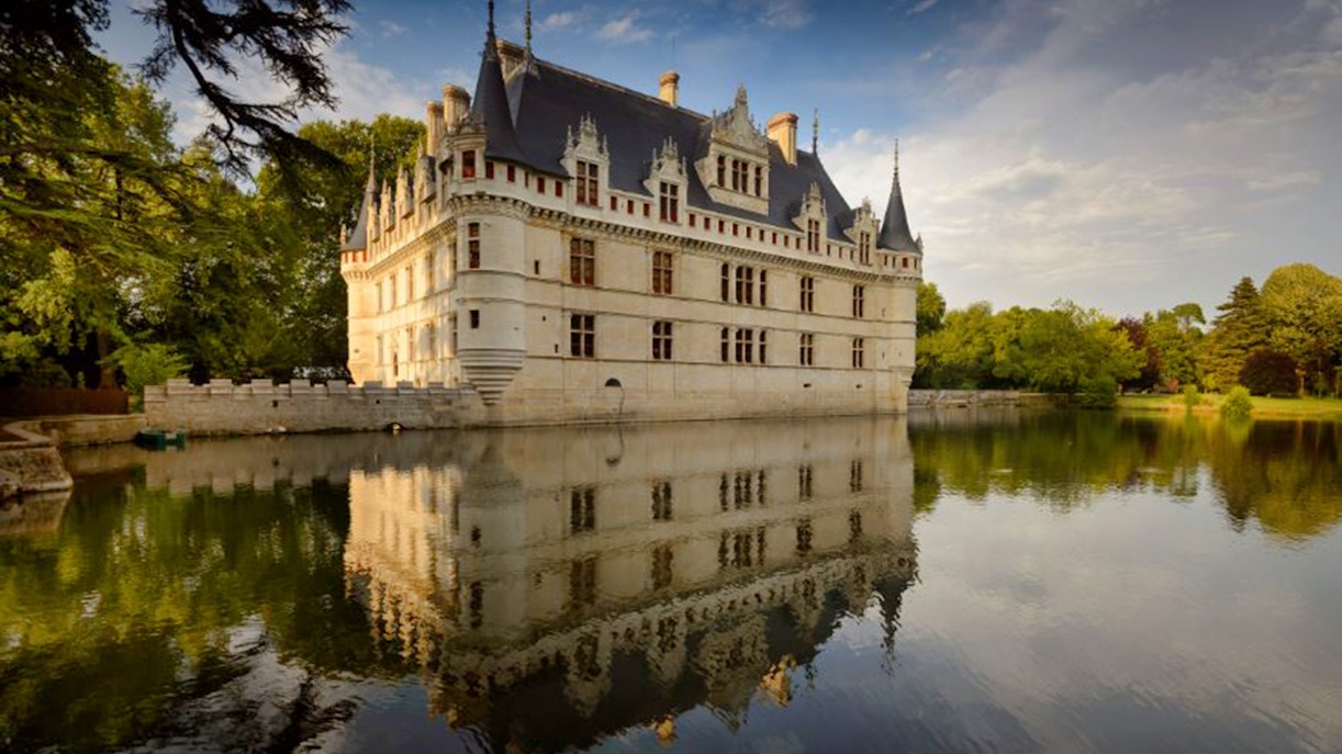 Azay le Rideau Castle reflected in water, part of Combo: Chambord + Azay le Rideau Castle Tickets.