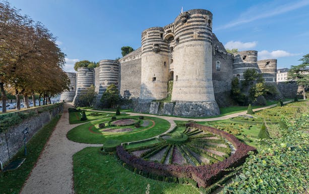 Angers Castle with its medieval towers and landscaped gardens in Angers, France.