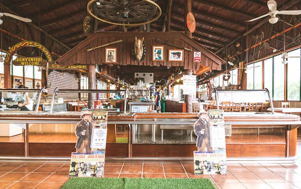 Interior of Fort Bravo Western Film Park restaurant in Tabernas Desert, featuring Western decor.