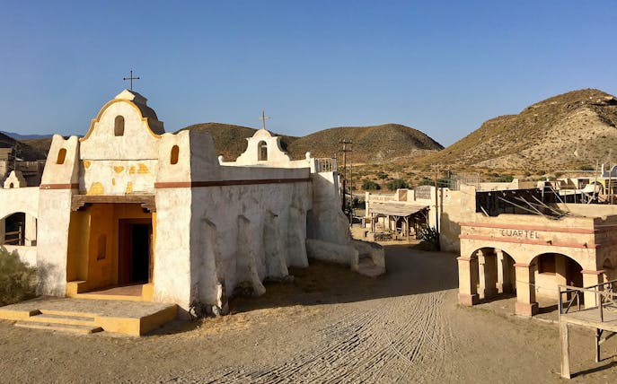 Fort Bravo Western Film Park in Tabernas Desert, Almería, featuring old western buildings.